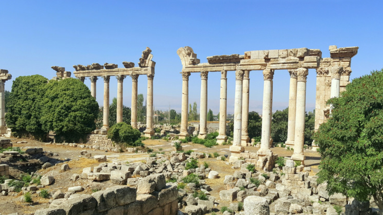 Ancient stone ruins at an international destination representing additional mission trip travel expenses.