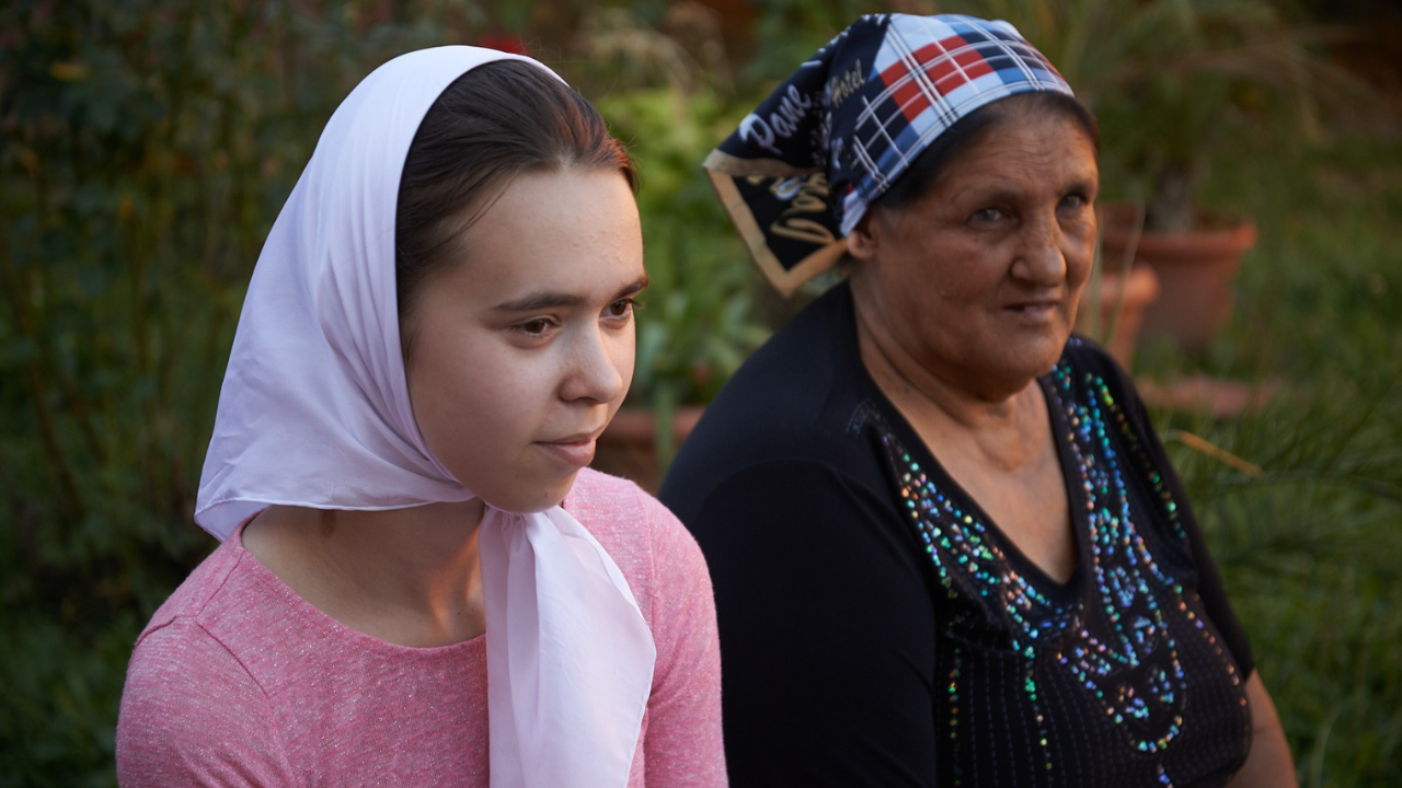 Two women participating in local outreach supported by the WMA mission trip fee.